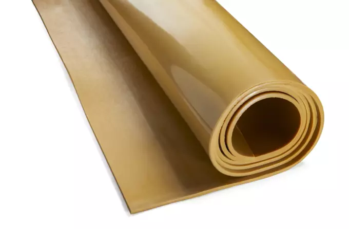 Rotolo di materiale flessibile in colore beige per applicazioni industriali